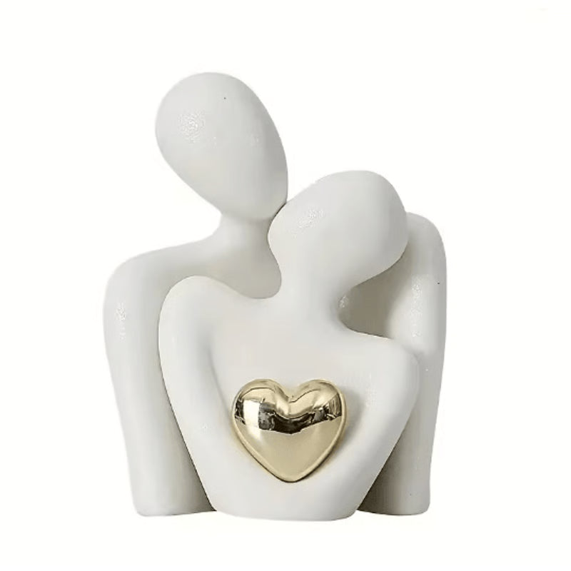 Abstract white ceramic couple sculpture with gold heart accent