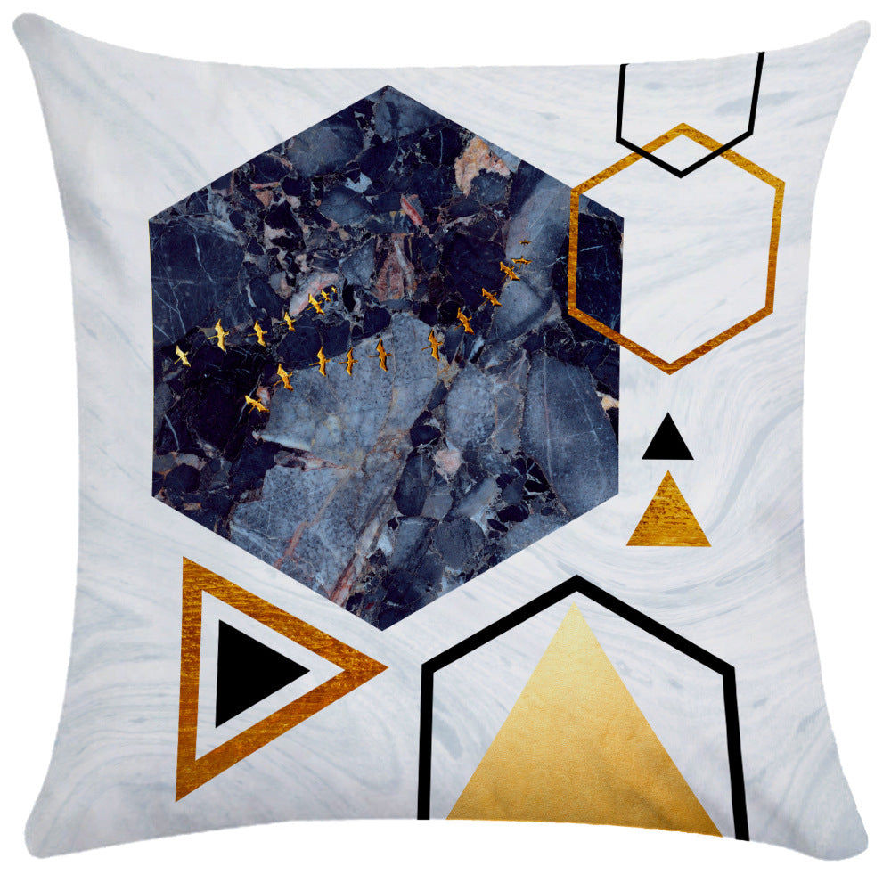 Dark blue hexagon pillow cover with gold bird silhouettes and geometric triangles