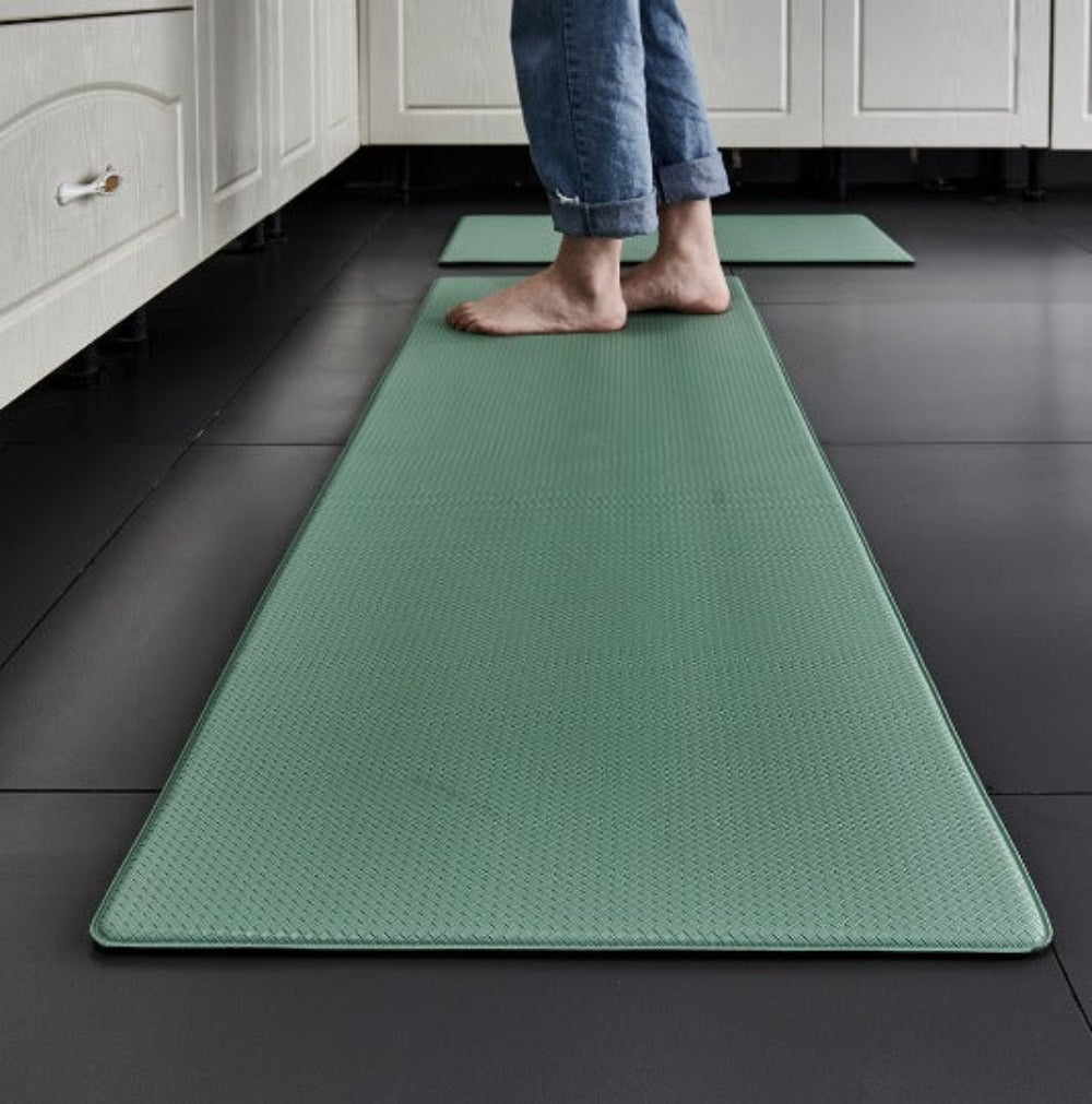 Green ergonomic kitchen floor mat with diamond texture and rounded corners