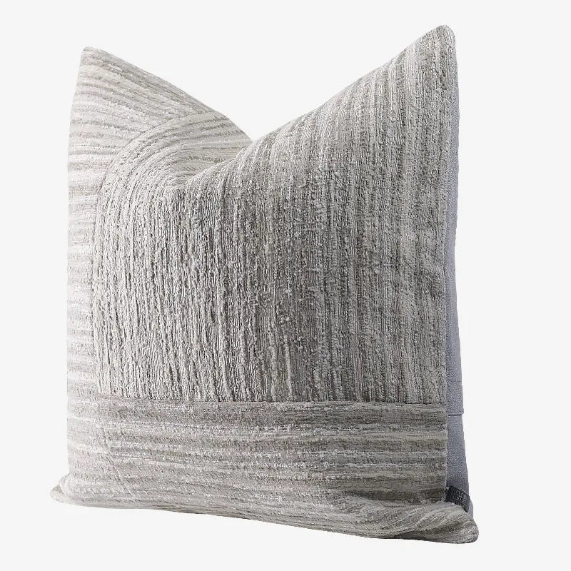 Neutral gray and off-white textured patchwork chenille throw pillow for modern living room sofa