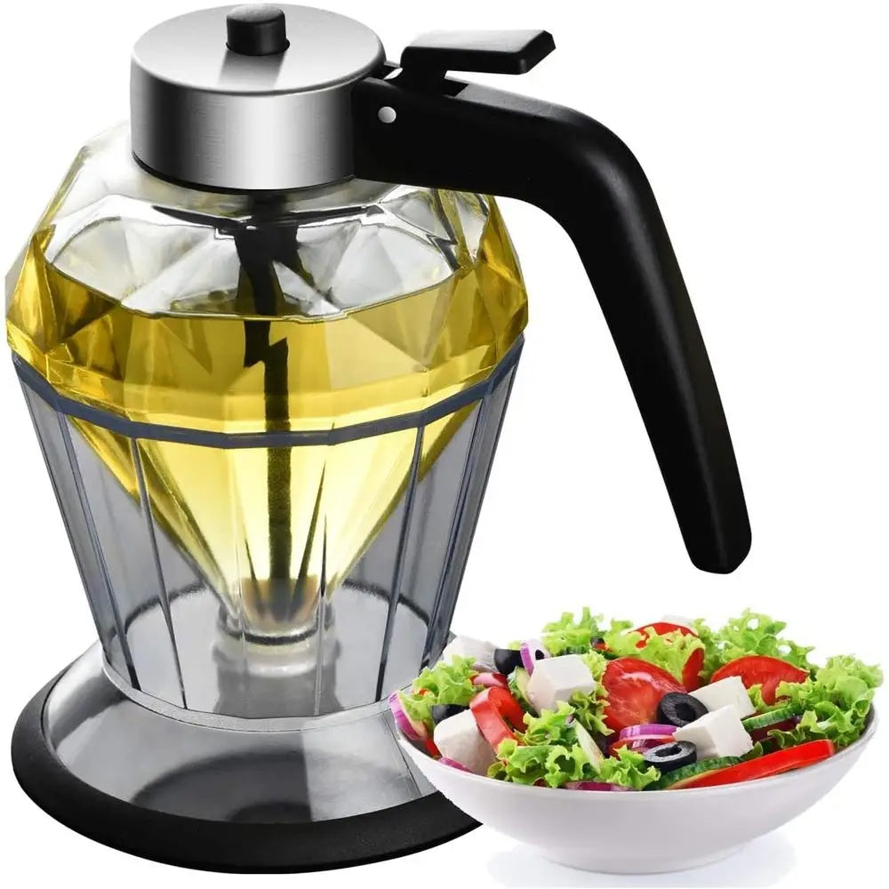 Diamond-shaped glass oil container beside Greek salad bowl