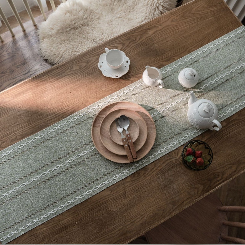 Elegant White Christmas Table Runner with Braided Design and Tassels 7