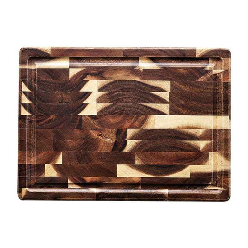 Top view of rectangular end grain wood cutting board with mosaic grain pattern