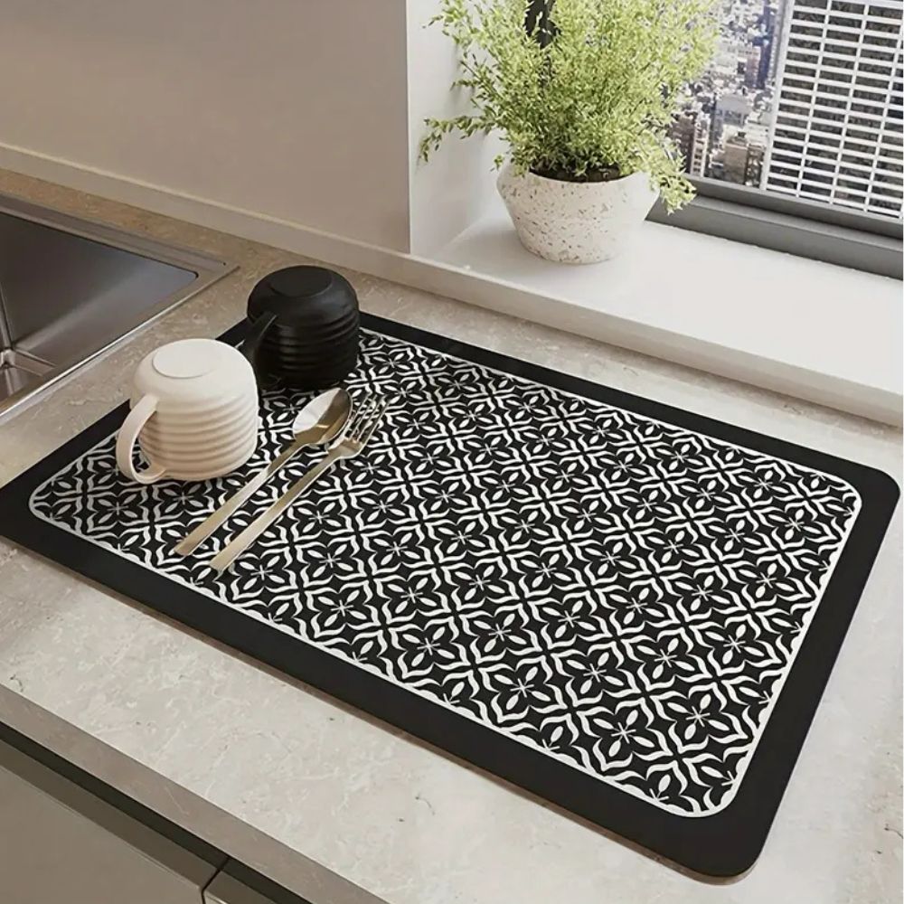Black silicone dish drying mat with white geometric mandala design