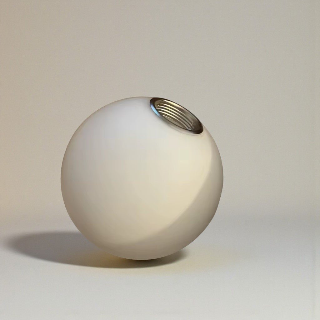 Close-up of uninstalled spherical sconce showing threaded socket detail