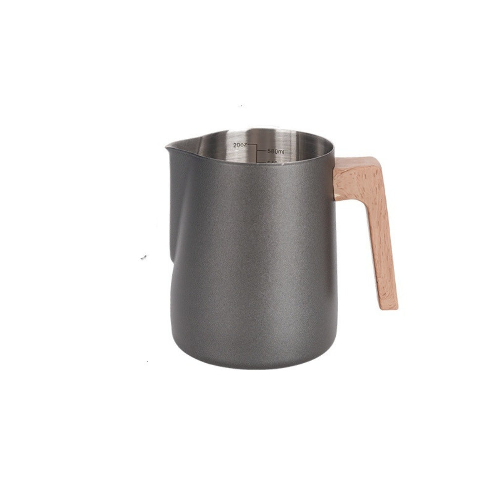 Matte cream pointed spout milk frothing pitcher with brushed steel body and wooden handle