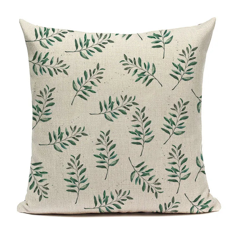 Repeating small green branch pattern pillow case with subtle dark speckles