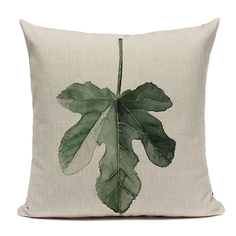 Large centered fig leaf watercolor botanical cushion cover in deep green