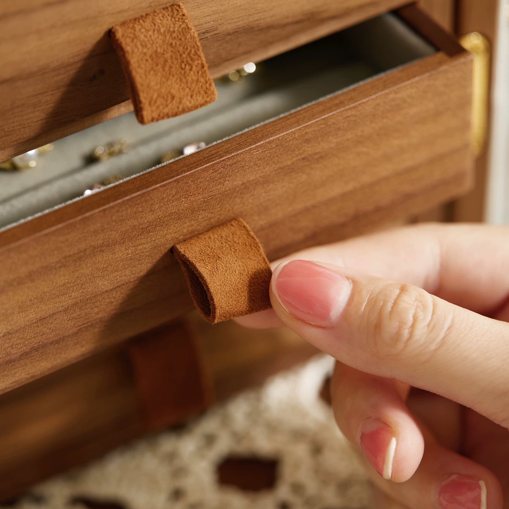 Suede pull tab opening ring drawer in walnut jewelry box