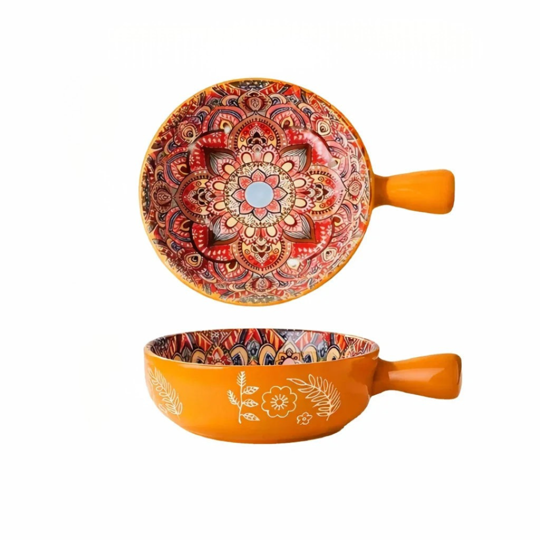 Orange boho ceramic handled bowl with red-orange mandala design and white floral line art exterior