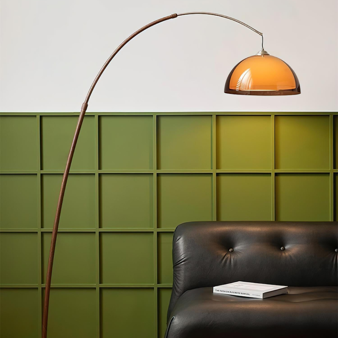Stylish dome shade floor lamp with curved metal arm in walnut finish