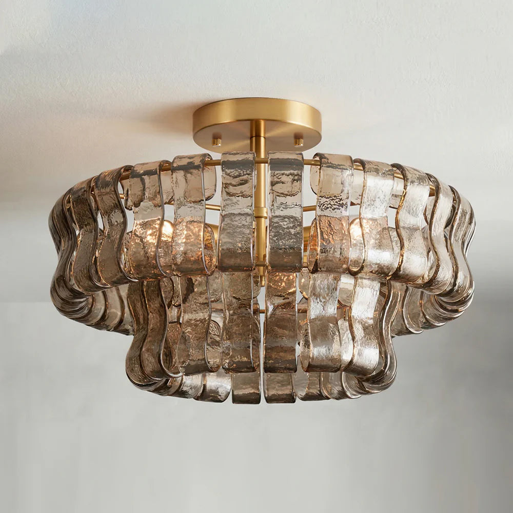 semi-flush mount brass chandelier with two tiers of smoky amber ripple glass