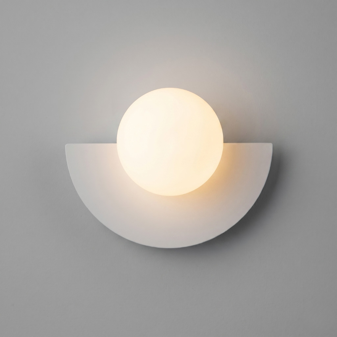 All-white modern LED wall sconce with matte finish and round plastic ball lampshade