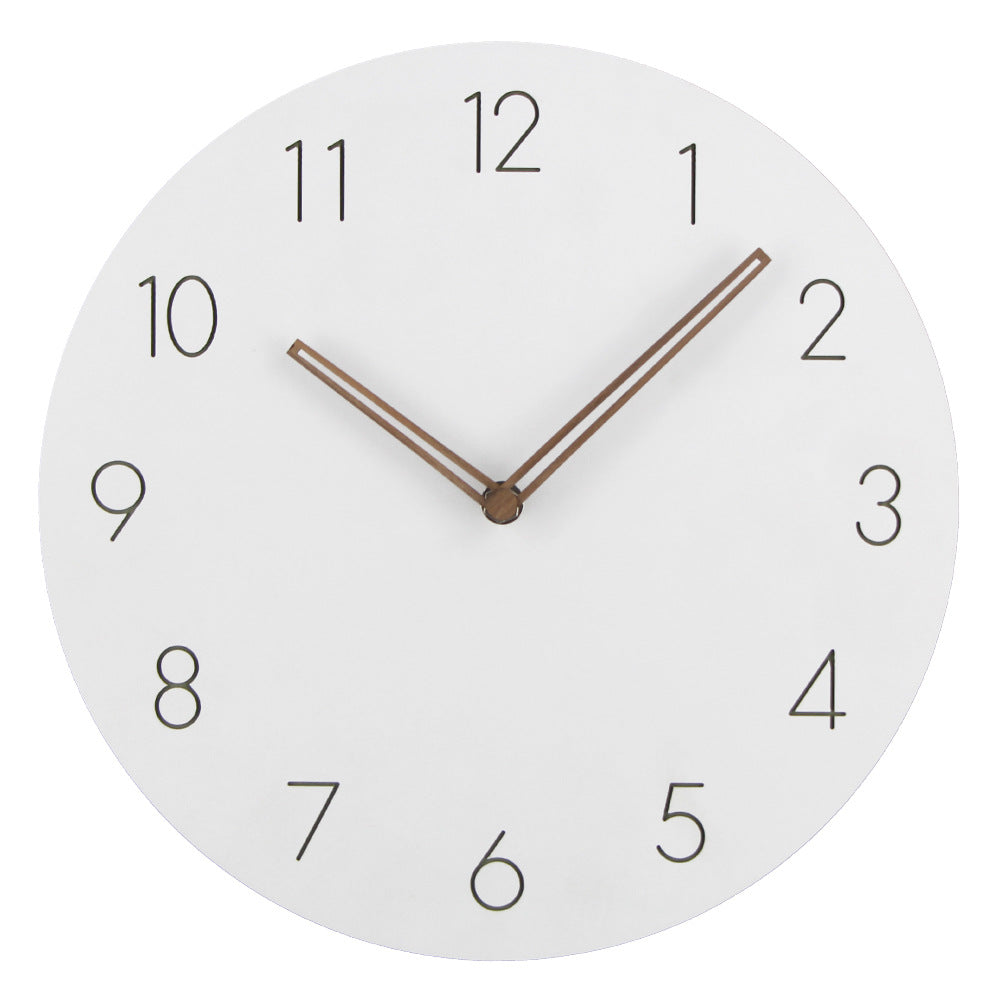 White minimalist wall clock with copper-toned metallic hands