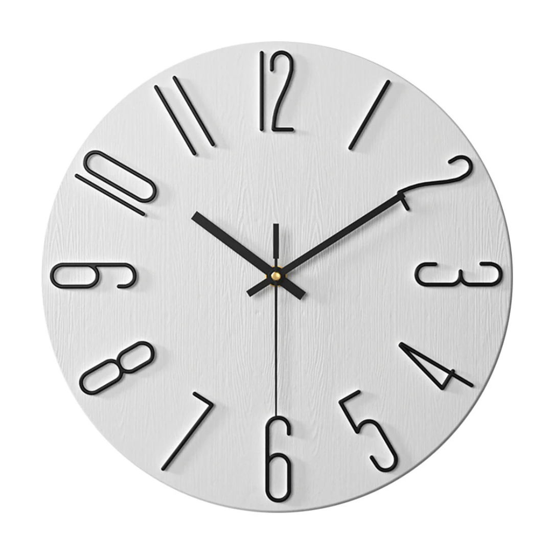 Black and white minimalist wall clock with contrasting metal numerals
