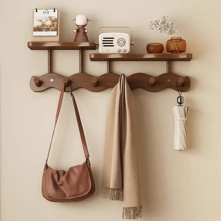 Dark brown bamboo wall mounted organizer with two shelves and rounded hanging hooks