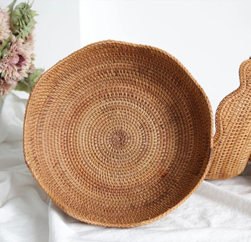 Top-down view of spiral weaving pattern inside natural rattan fruit basket