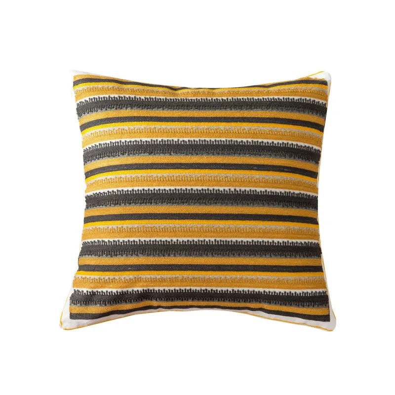 Mustard and gray striped pillow with fringed raised embroidery texture detail