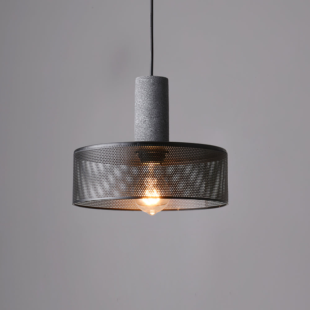 Linear pendant chandelier featuring perforated cylinder glass shade