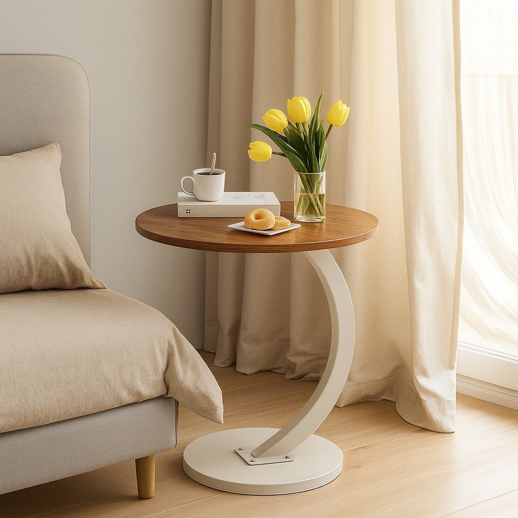 Cantilever side table beside bed for small apartment use