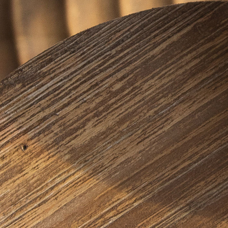 Natural wood grain texture detail on rustic round top of decorative stand