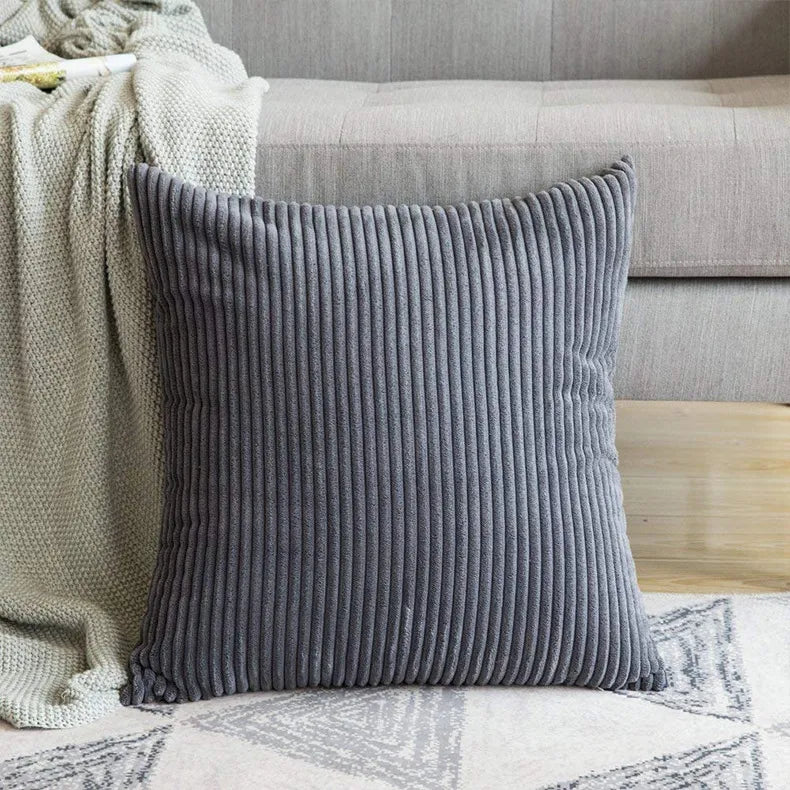 Gray corduroy square pillow showing detailed ribbed texture and angled fit