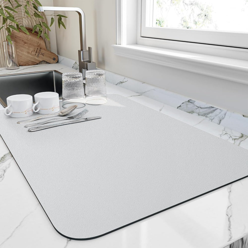 Light gray countertop drying mat for efficient post-meal cleanup
