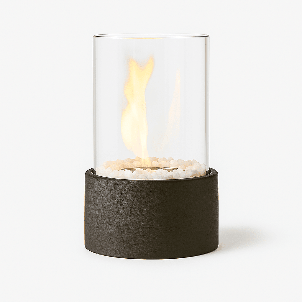 Textured concrete tabletop fire pit with glass cylinder and white pebbles
