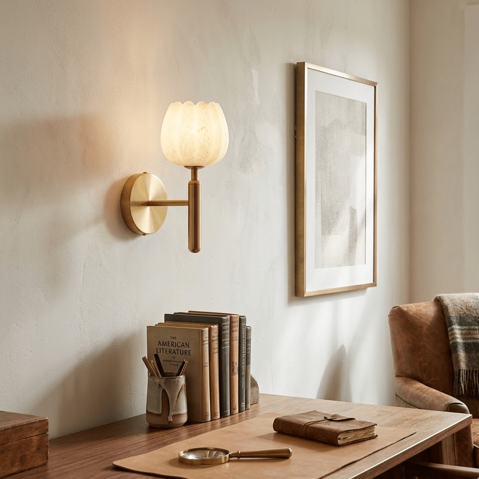 Lotus shade alabaster wall light above wooden desk with warm glow
