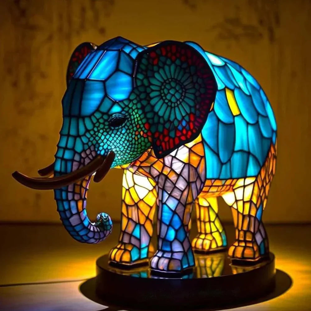 Blue elephant stained glass table lamp with floral ear detail