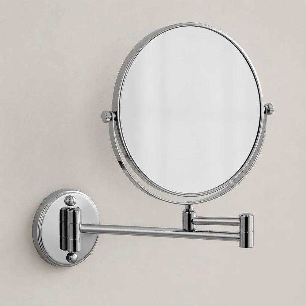 Front view of round chrome wall mounted makeup mirror showing dual arm articulation and mounting plate