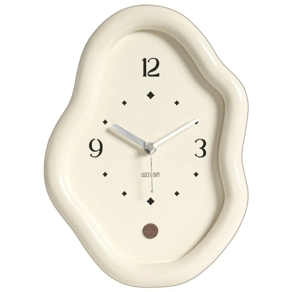 Cream-colored wavy desk clock with smooth finish and black numerals
