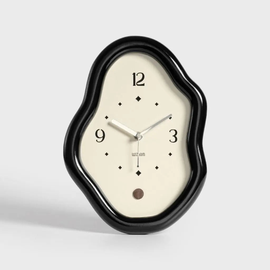 Black high-gloss wavy table clock with 'wozom' brand label visible