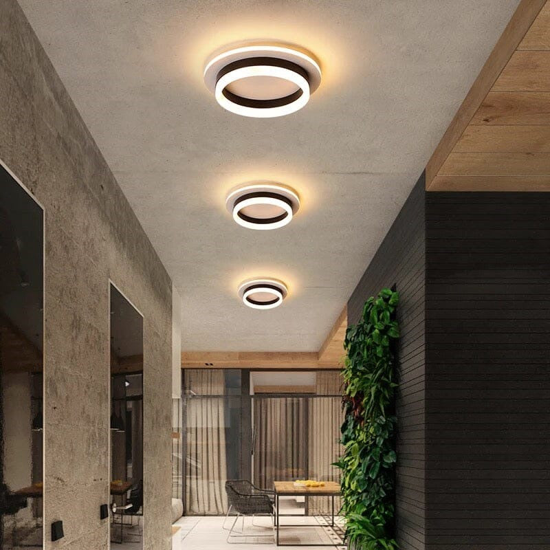 Maintained House Floating Ring LED Ceiling Light - Round in Black, three in a row along a hallway ceiling