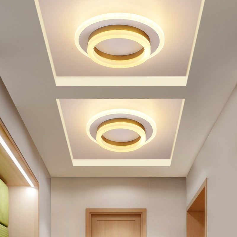 Maintained House Floating Ring LED Ceiling Light - Round in Gold, two along a hallway ceiling