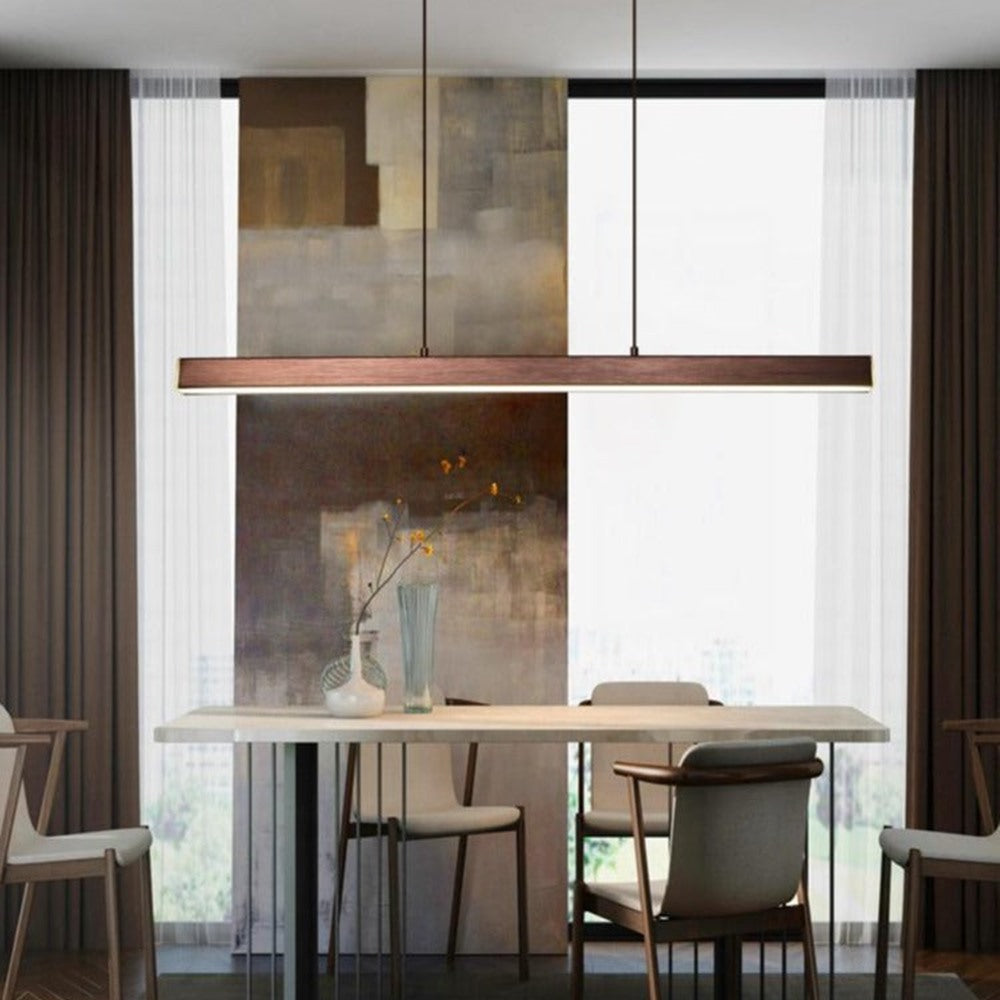 Maintained House Linear LED Bar Pendant Light - Brushed Coffee in a dining room