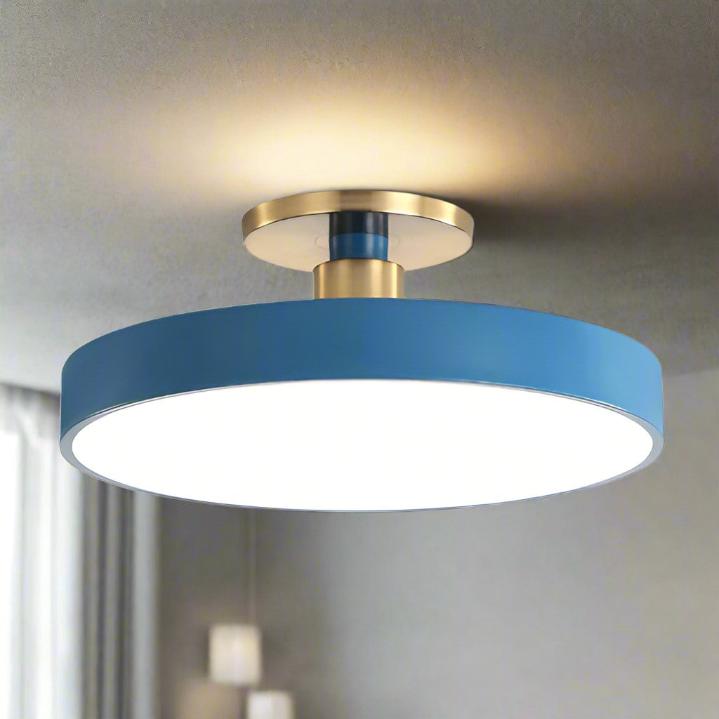 Maintained House Macaron Drum LED Ceiling Light - Blue, lit, with the gold-tone canopy