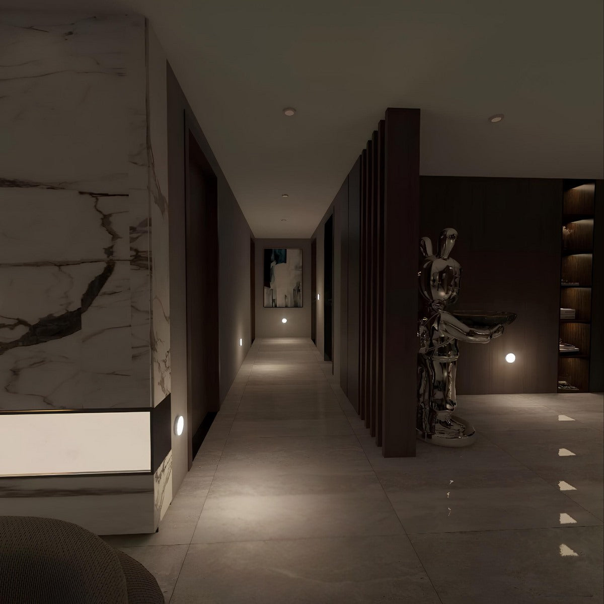 Maintained House Motion Sensor Puck Light - A row of lights along a dark corridor