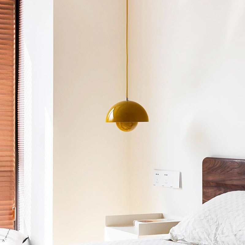Maintained House Nested Dome Pendant Light - Mustard Yellow over a bed