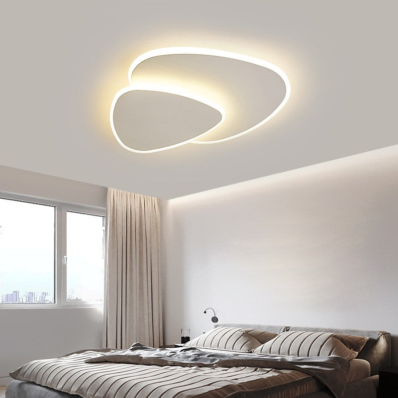 Maintained House Pebble Overlap LED Ceiling Light - Lit over a bed