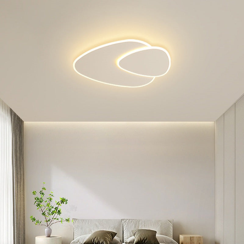 Maintained House Pebble Overlap LED Ceiling Light - In a white bedroom