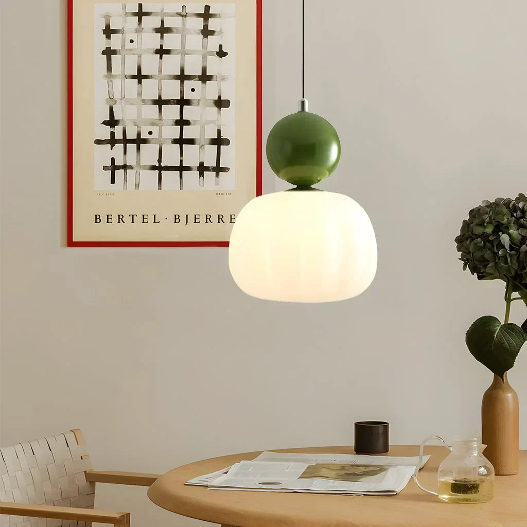 Maintained House Pumpkin Pendant Light - Single Pendant in Olive Green above a round dining table