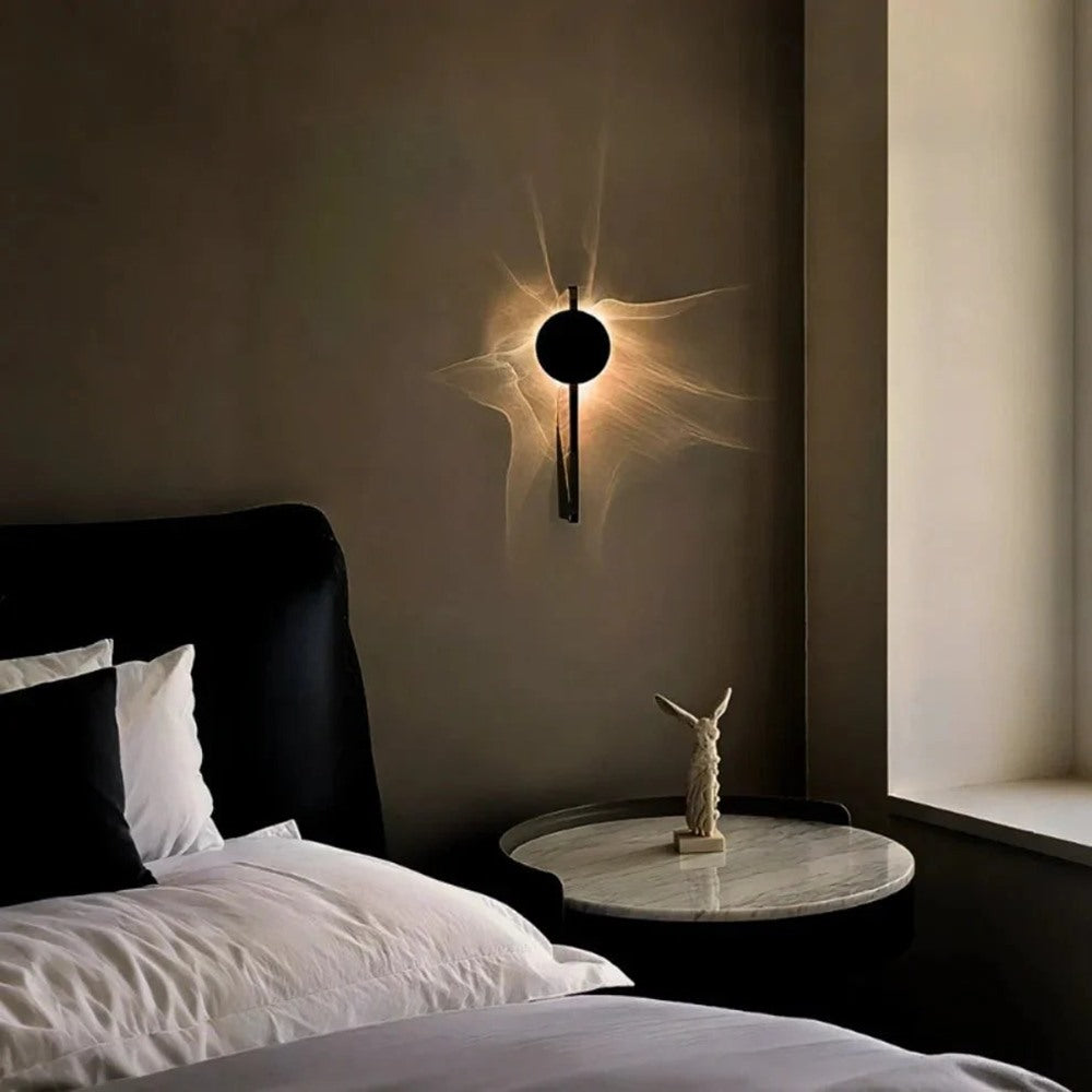 Maintained House Rotating Ripple Light Wall Sconce - Single lamp above a bedside table