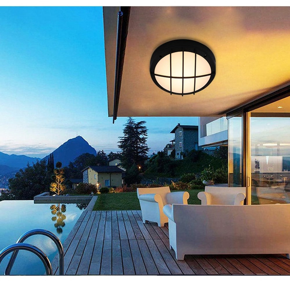Maintained House Round Outdoor LED Wall Light - Grid style mounted on a patio ceiling