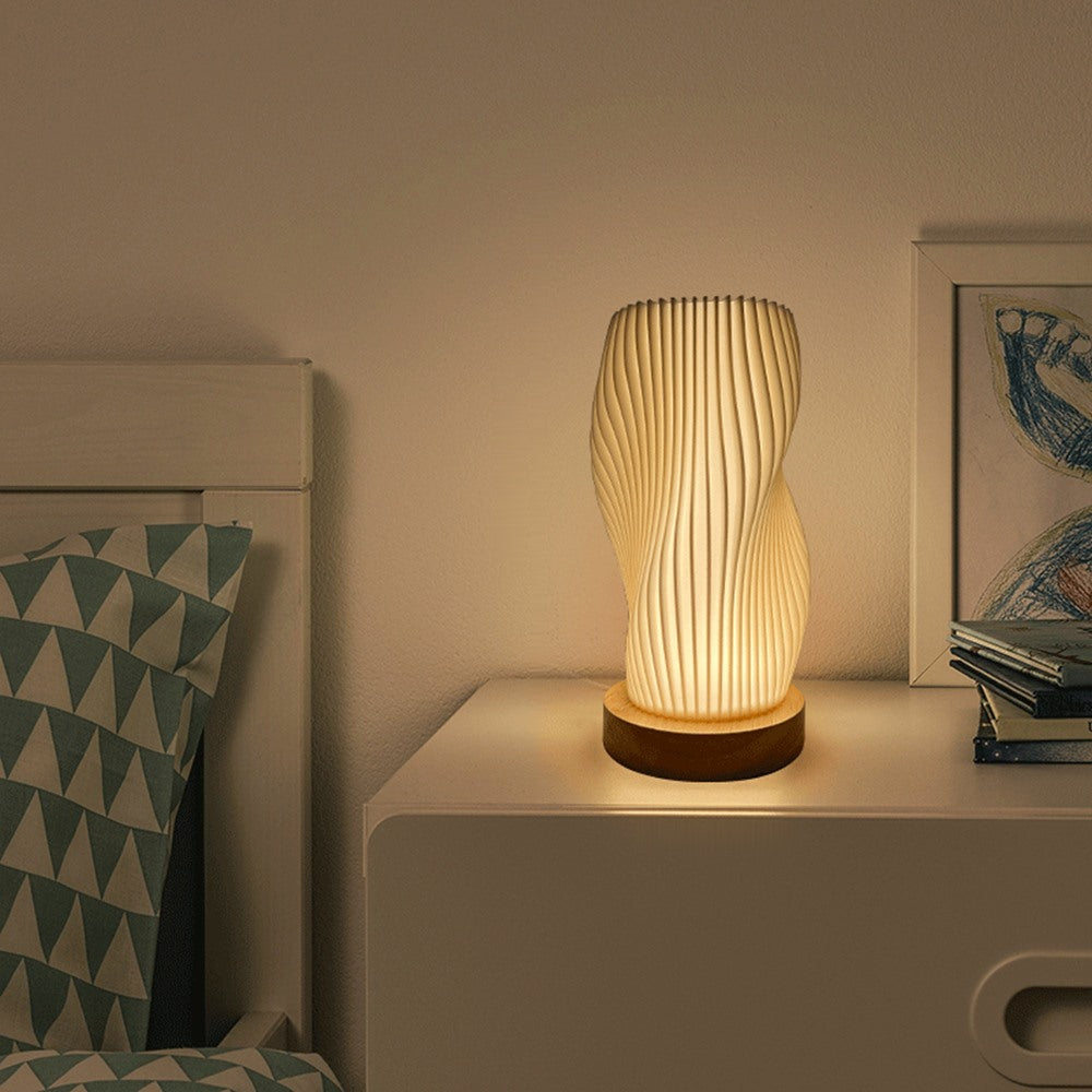 Maintained House Sculpted Wave Table Lamp - Curve style on a nightstand