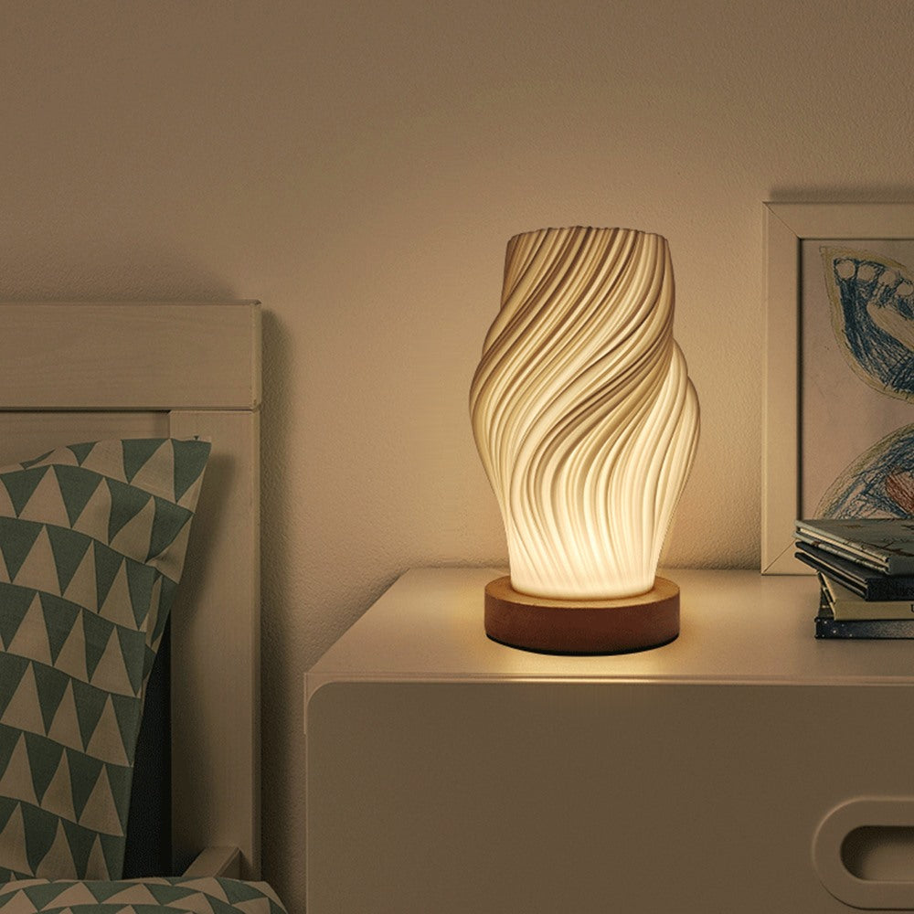 Maintained House Sculpted Wave Table Lamp - Swirl style on a nightstand