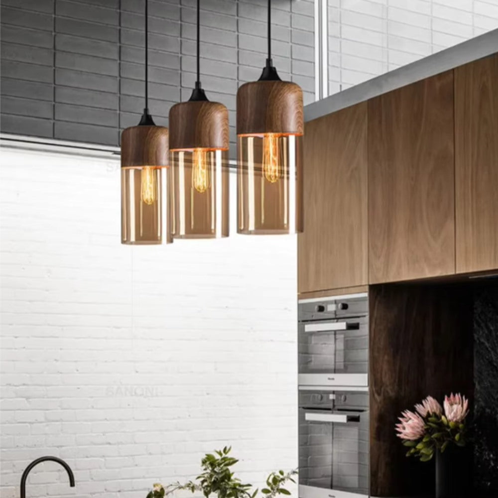 Maintained House Wood Grain Amber Glass Pendant Light - Three cylinders over a kitchen counter