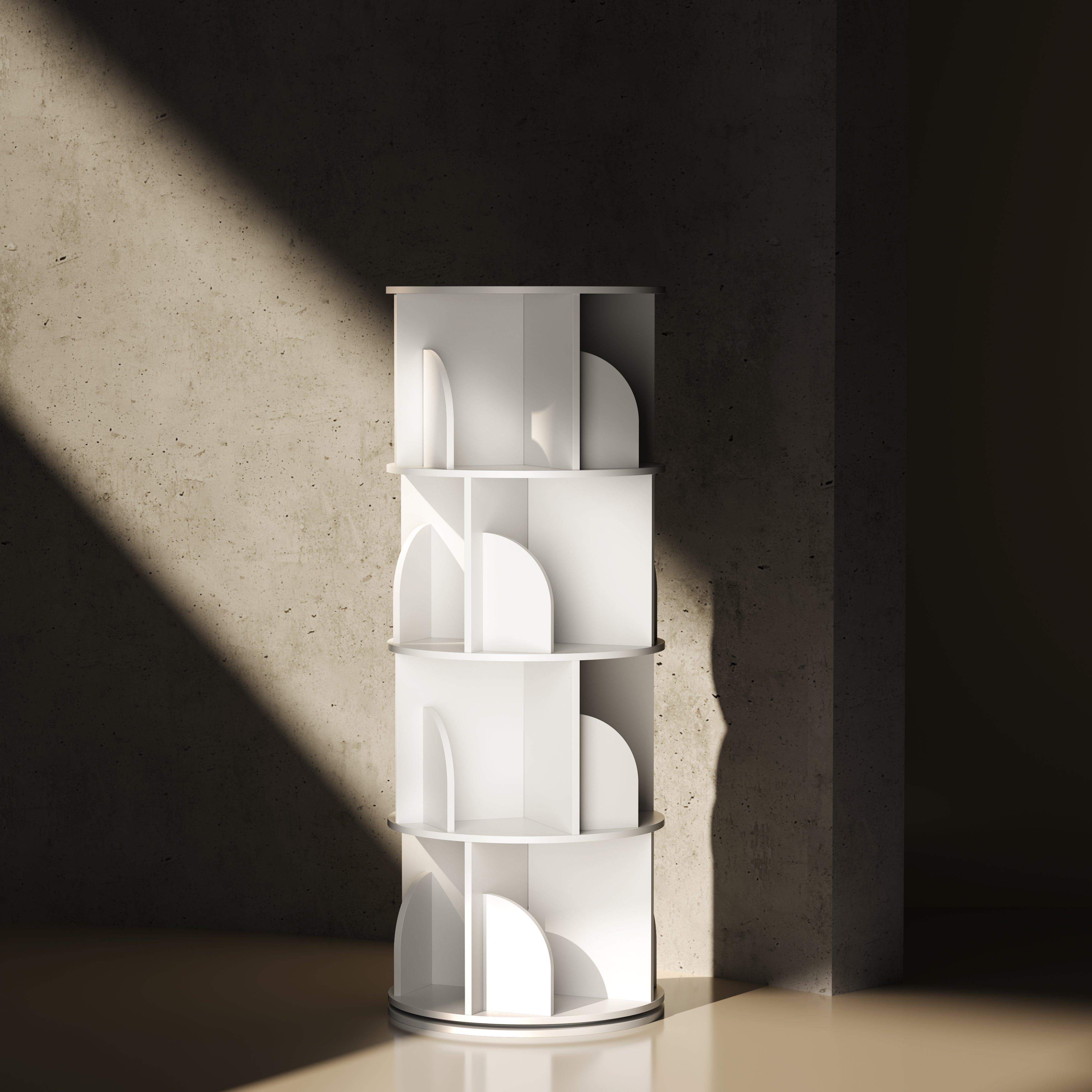 White 4-tier rotating bookshelf with arched dividers against concrete wall