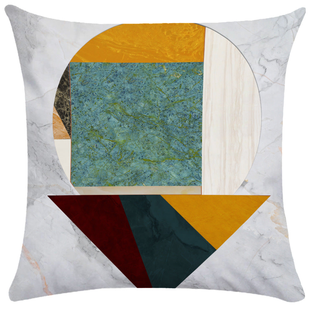 Asymmetrical modern pillow cover with teal wood grain and orange geometric cutouts