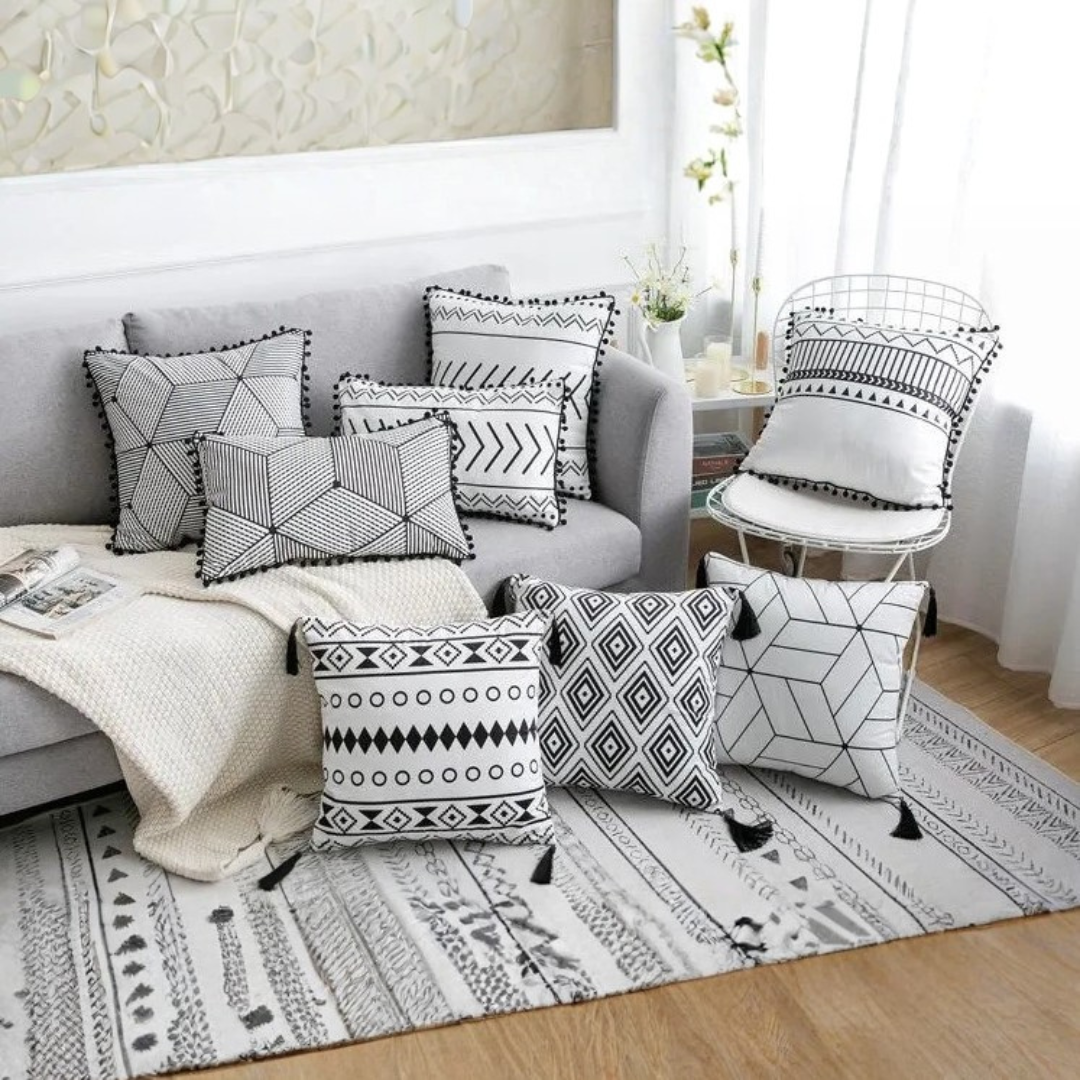 Bohemian black and white cushion cover featuring diamond and chevron patterns